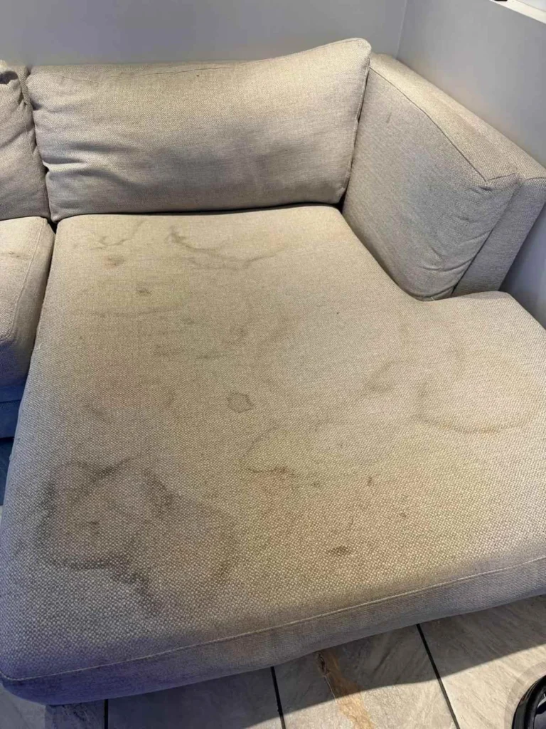 Grey corner sofa chaise before professional cleaning by Clearway Trusted Cleaning